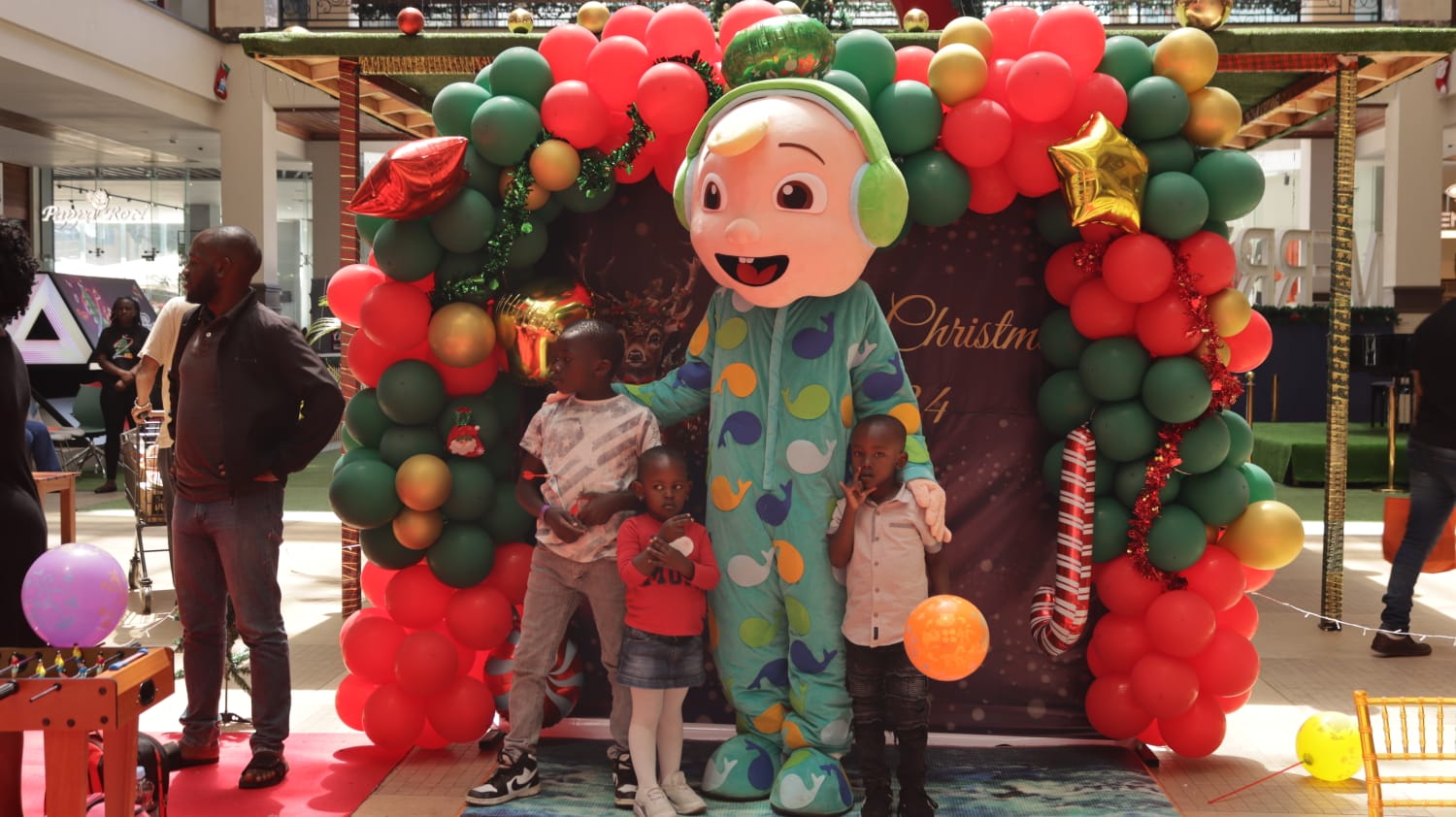 Happy family playing together in backyard